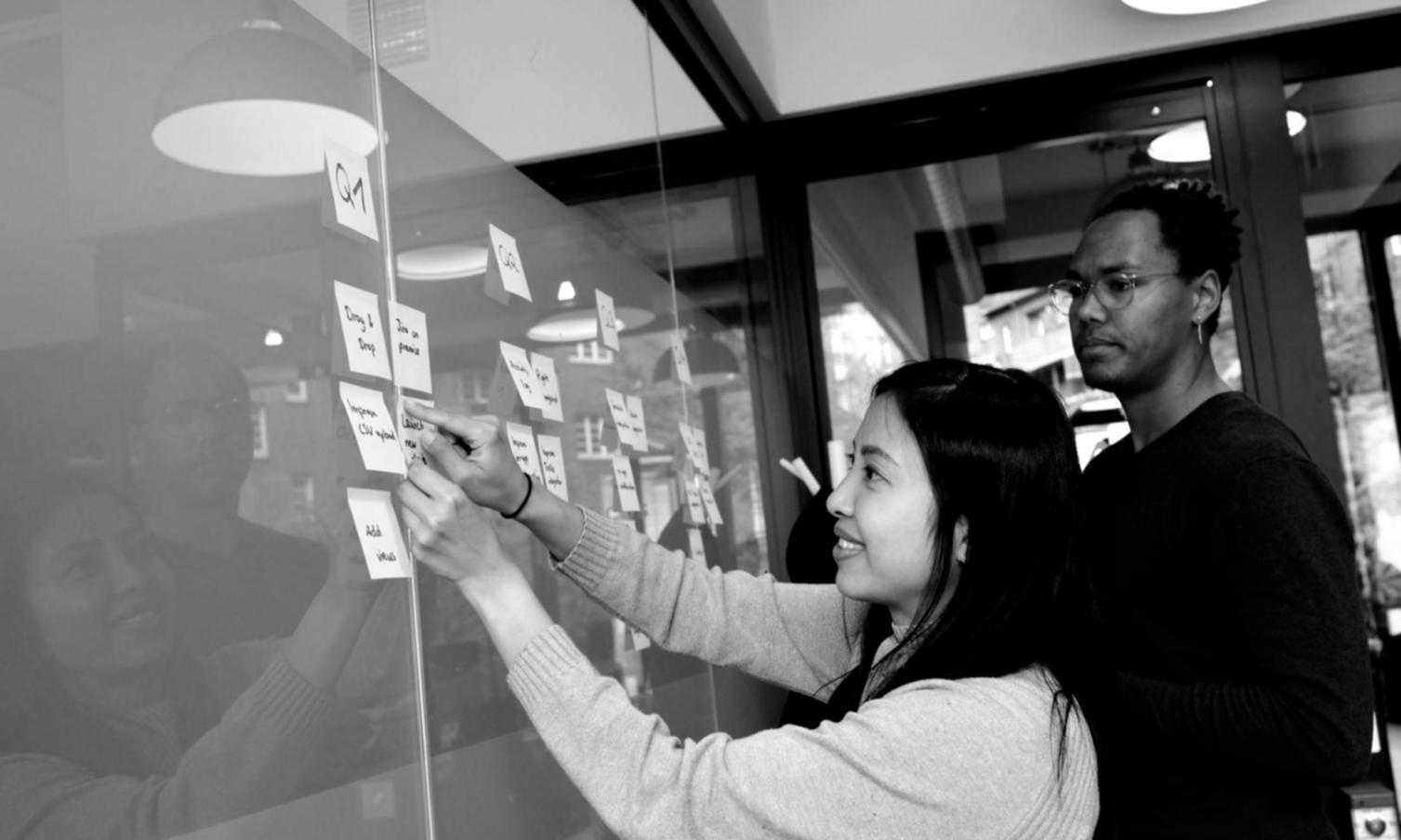 Business owner reviewing comparative financial reports and industry benchmarks